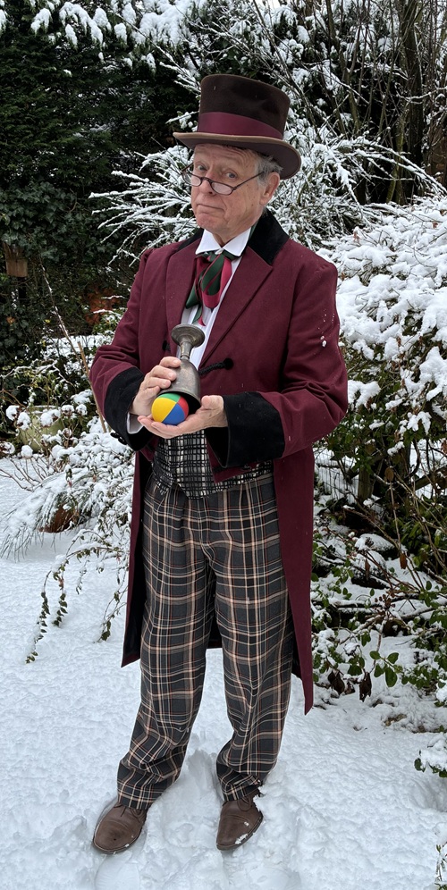 Dickens Entertainermet goochelen www.kerst-entertainers.nl